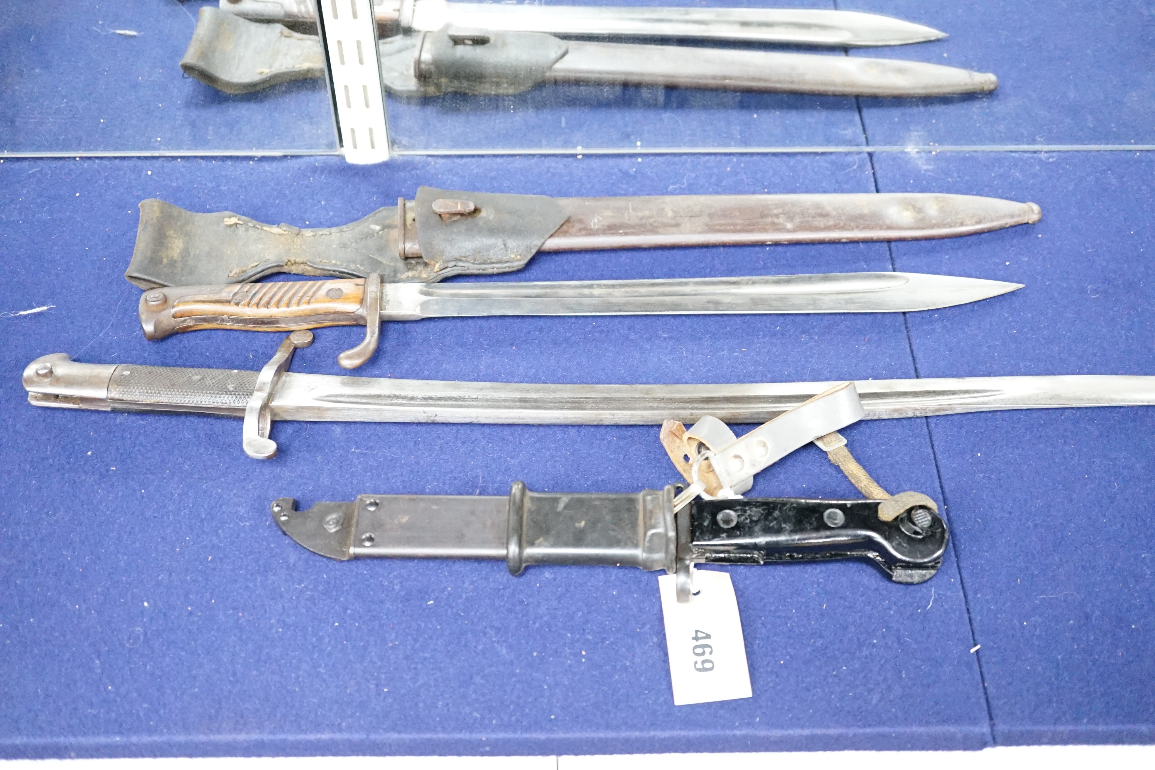 Two bayonets - one by P.D. Lüneschloss, Solingen - together with a dagger